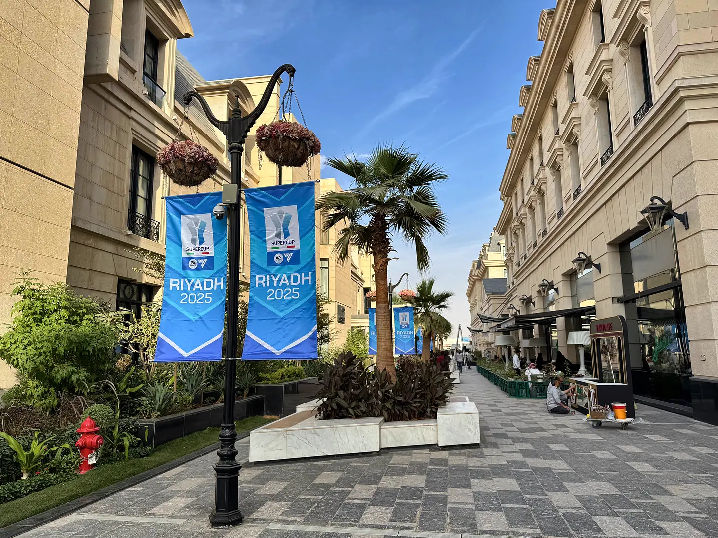 Riyadh 2025 banners along the boutique street